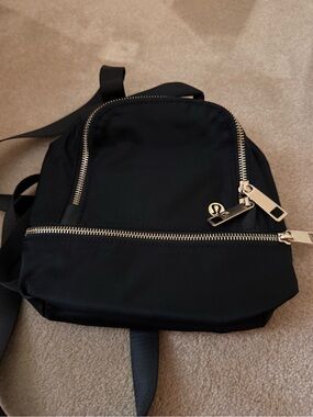 lululemon athletica Black Mini Backpack with Gold Hardware